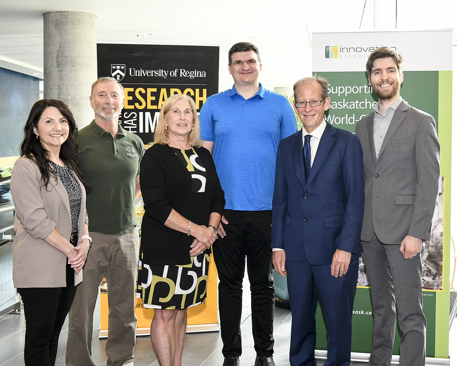 Photo at the Innovation Saskatchewan announcement at the U of R. (l to r) Kari Harvey, CEO of Innovation Saskatchewan; Dr. Garth Huber; the Honourable Colleen Young, Minister of Advanced Education; Dr. Gojko Vujanovic; Dr. Jeff Keshen, President and Vice-Chancellor of the U of R; Dr. Arthur Situm (Photo courtesy of Innovation Saskatchewan)